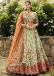 Pastel Green Silk Lehenga Choli With Orange Net Dupatta